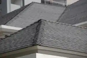 Overlapping gray shingle roofs