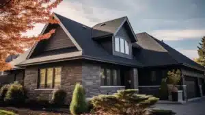 A modern suburban home with a gray shingled roof, highlighting the best roofing company San Diego.